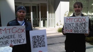 Two sad Bitcoin enthusiasts outside Mt. Gox.